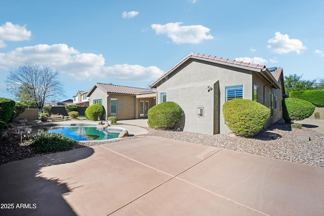 2207 W Hidden Treasure Way, Phoenix, AZ 85086 - back of property featuring stucco siding, a patio, a tiled roof, and french doors