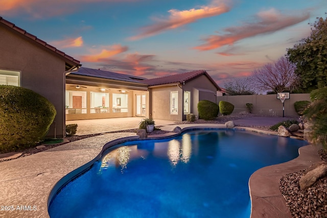 2207 W Hidden Treasure Way, Phoenix, AZ 85086 - view of pool with ceiling fan, a patio area, and a fenced backyard