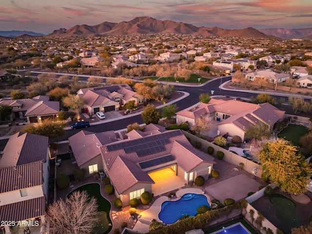 2207 W Hidden Treasure Way, Phoenix, AZ 85086 - aerial view at dusk of a mountain view, view of pool, and a residential view