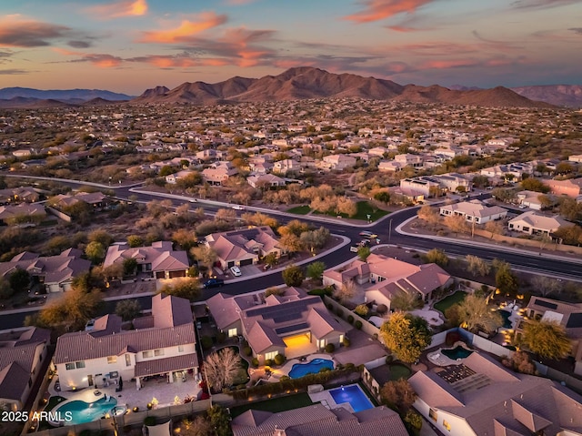 2207 W Hidden Treasure Way, Phoenix, AZ 85086 - aerial view at dusk of a residential view and a mountain view