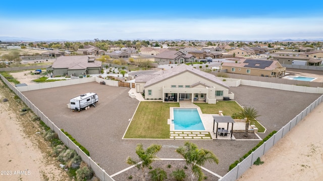 view of swimming pool with a lawn and a patio area