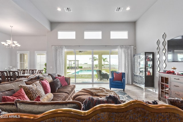 living room featuring an inviting chandelier