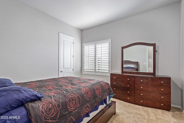 bedroom with light carpet