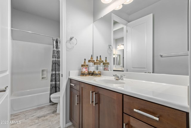 full bathroom featuring shower / tub combo, toilet, tile floors, and vanity