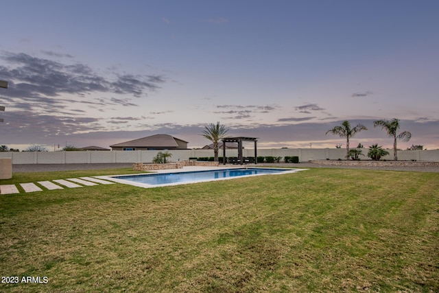 exterior space with a fenced in pool