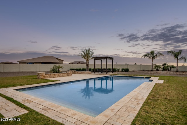 pool at dusk with a pergola and a yard