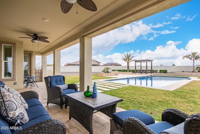 view of patio featuring a fenced in pool, outdoor lounge area, and ceiling fan