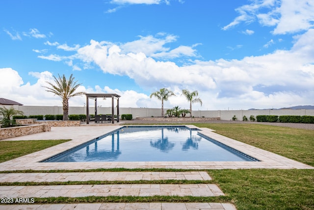 view of swimming pool with a yard, a pergola, and a patio