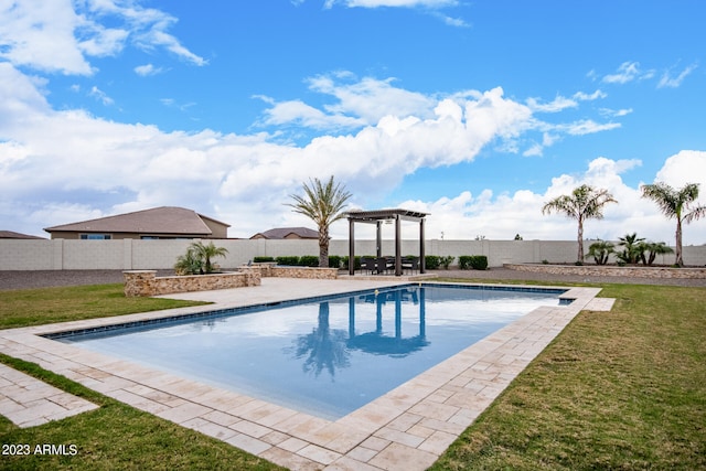 view of pool with a pergola and a yard