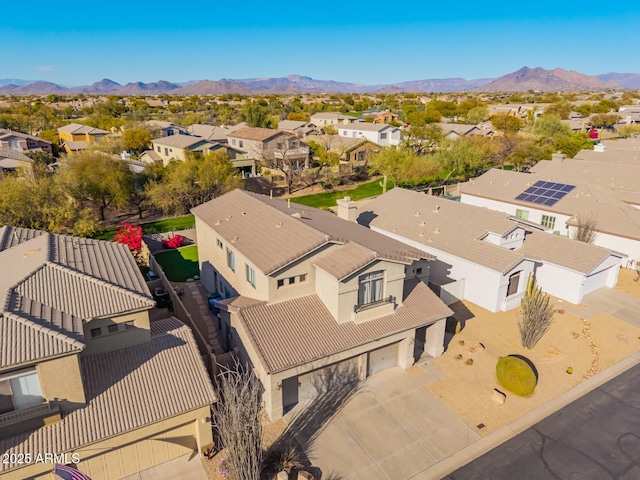 drone / aerial view featuring a mountain view