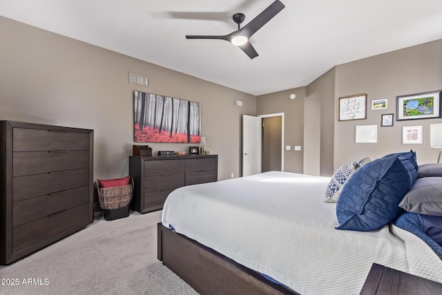 carpeted bedroom featuring ceiling fan