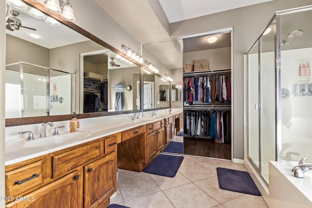 bathroom featuring vanity, separate shower and tub, and tile patterned flooring