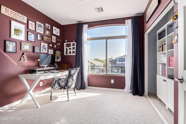 home office with light carpet