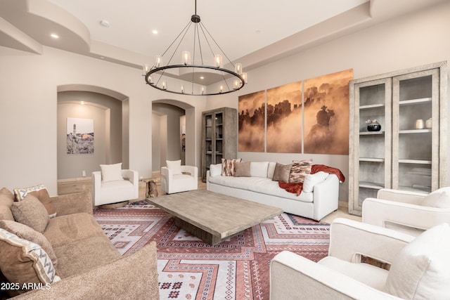 living room featuring a chandelier