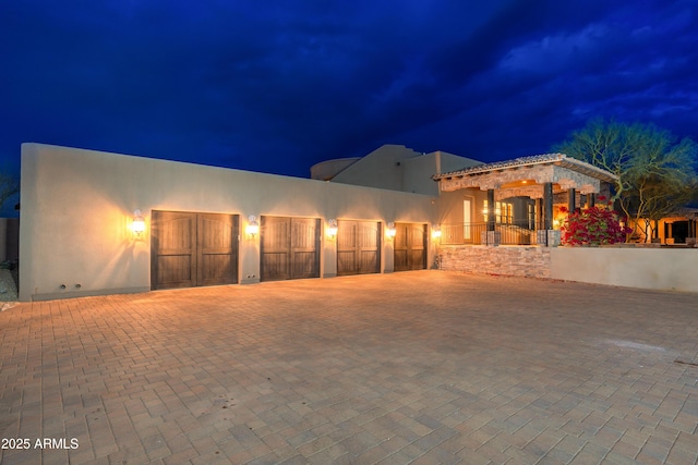 view of front of home with a garage