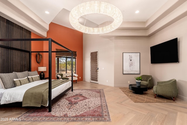 bedroom with parquet flooring and a high ceiling