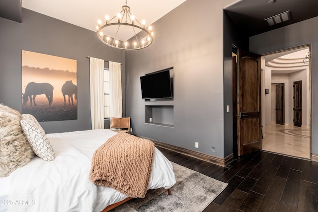 bedroom with an inviting chandelier