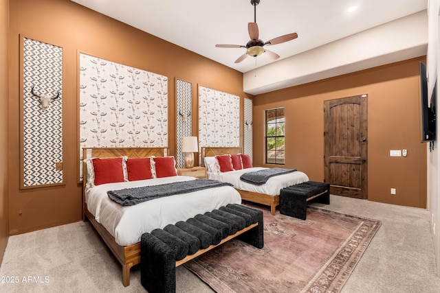 carpeted bedroom with ceiling fan