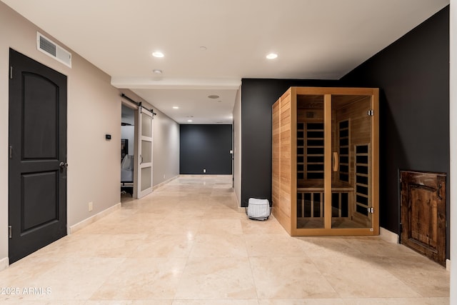 wine room featuring a barn door