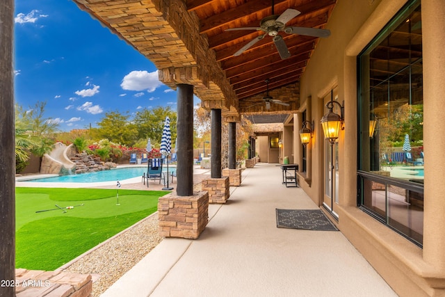 view of patio featuring ceiling fan