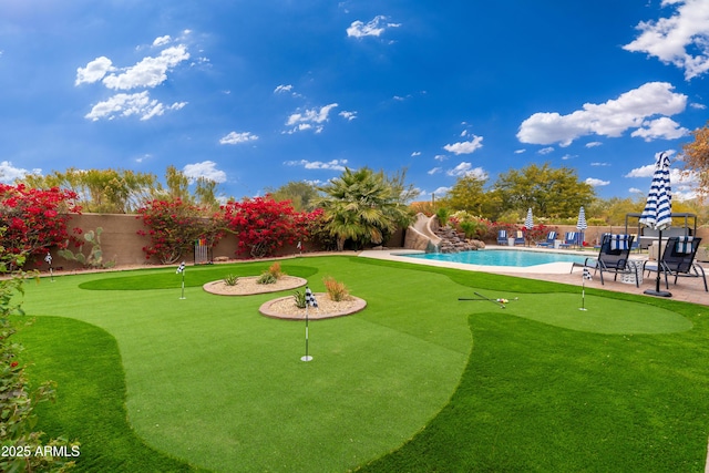 surrounding community featuring a pool and a patio area