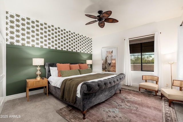 bedroom with ceiling fan and carpet floors