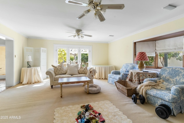 carpeted living room with crown molding and french doors