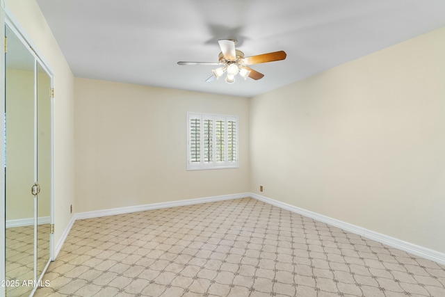 unfurnished room with light colored carpet and ceiling fan