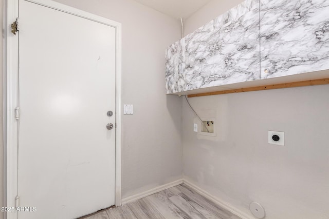 washroom featuring light wood finished floors, hookup for a washing machine, electric dryer hookup, laundry area, and baseboards