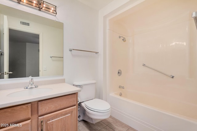 full bathroom featuring vanity, shower / tub combination, tile patterned floors, and toilet