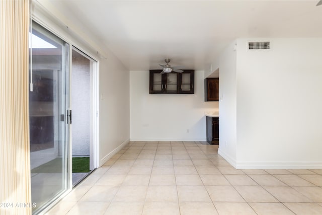 interior space with light tile patterned floors