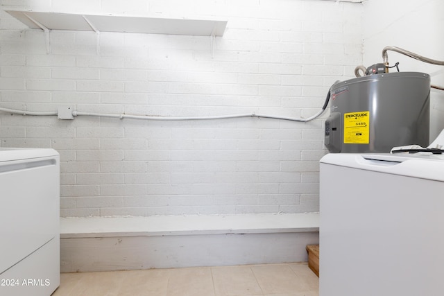 interior space with washer / dryer and electric water heater