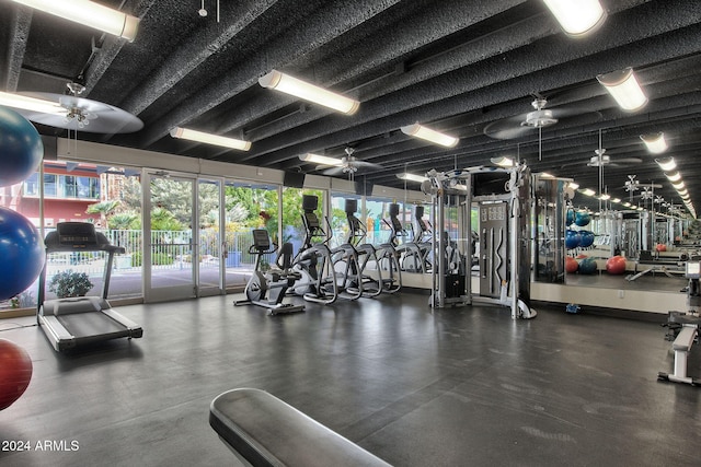 workout area featuring ceiling fan