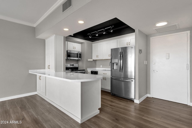 kitchen featuring kitchen peninsula, white cabinets, stainless steel appliances, and dark hardwood / wood-style floors