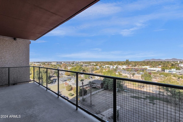 balcony featuring a mountain view