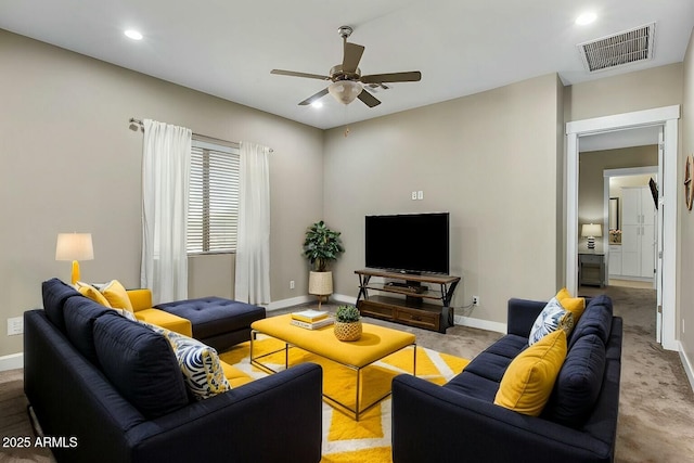 living area featuring recessed lighting, light colored carpet, a ceiling fan, baseboards, and visible vents