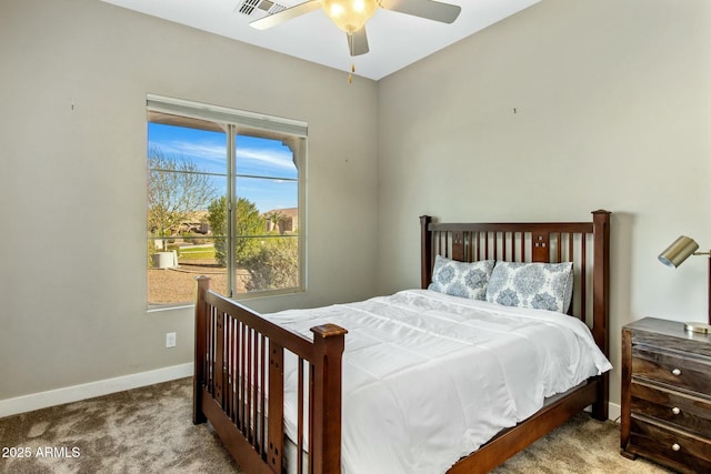 bedroom with light carpet, ceiling fan, visible vents, and baseboards