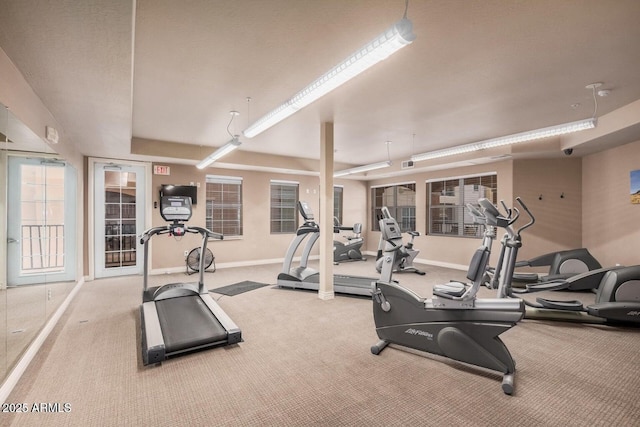 gym with visible vents and baseboards