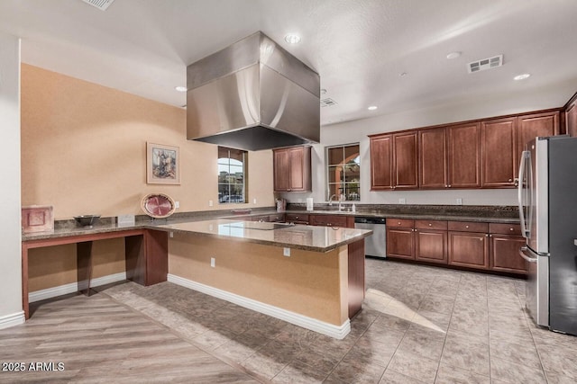 kitchen featuring recessed lighting, visible vents, appliances with stainless steel finishes, dark stone counters, and island exhaust hood