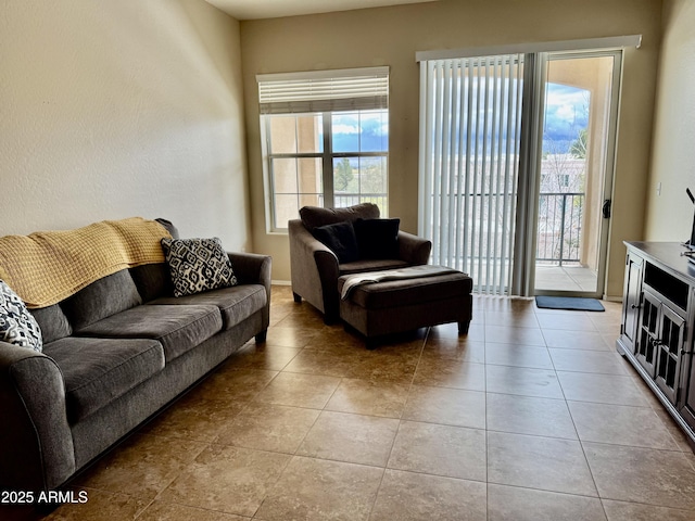 living room featuring light tile patterned flooring