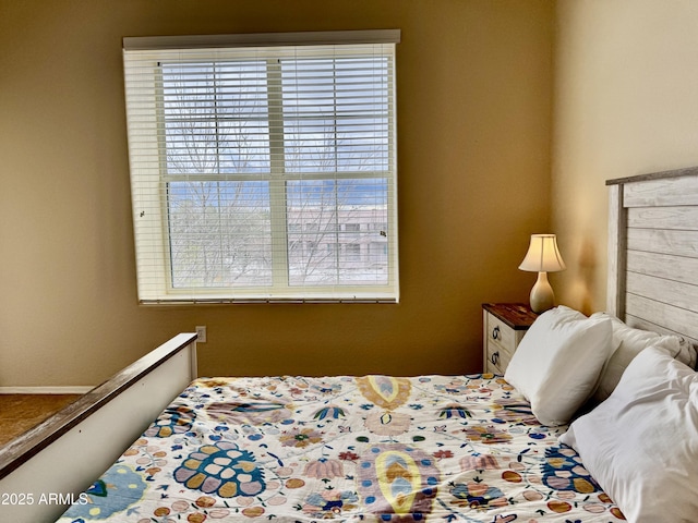 bedroom with multiple windows