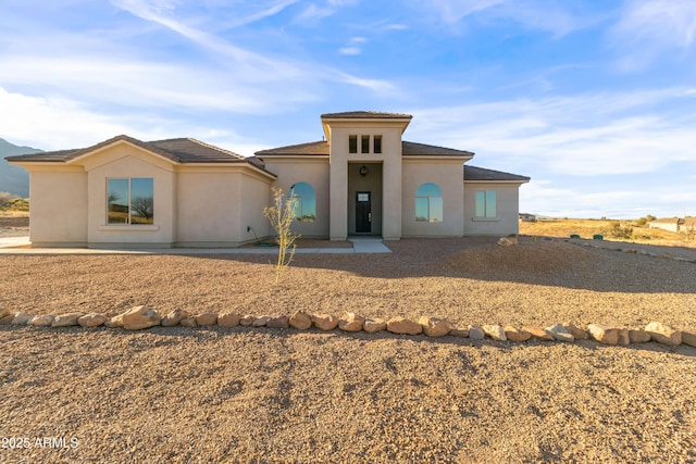 view of front facade with a patio