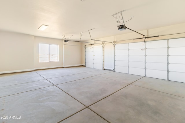 garage featuring a garage door opener