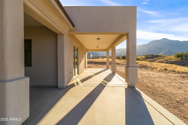 view of patio with a mountain view