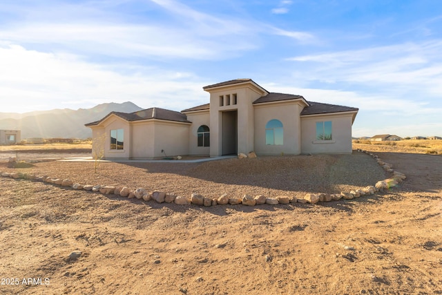 view of front of house with a mountain view