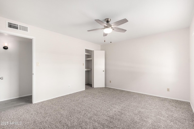 19031 N 13th Dr, Phoenix, AZ 85027 - unfurnished bedroom featuring carpet, baseboards, ceiling fan, and a closet