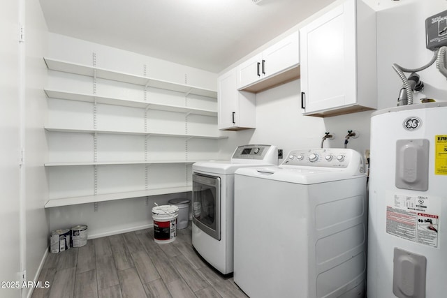 19031 N 13th Dr, Phoenix, AZ 85027 - washroom with water heater, cabinet space, light wood-style flooring, separate washer and dryer, and baseboards