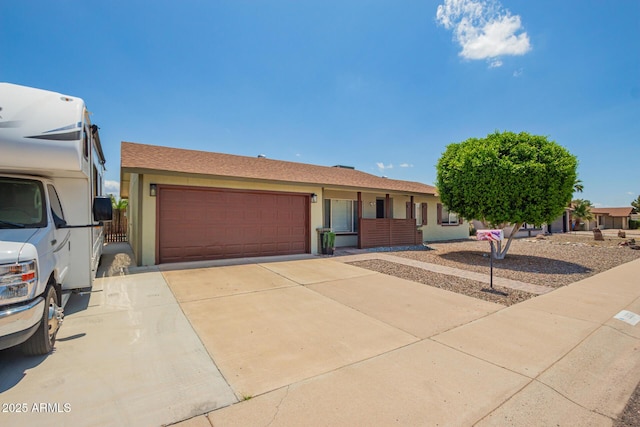 19031 N 13th Dr, Phoenix, AZ 85027 - ranch-style home featuring a garage, stucco siding, and driveway