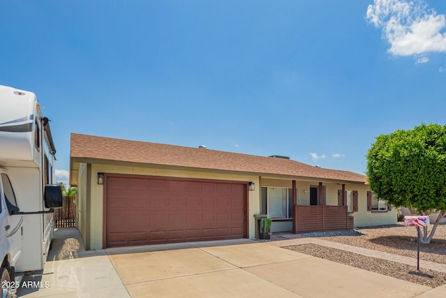 19031 N 13th Dr, Phoenix, AZ 85027 - ranch-style home featuring a garage, stucco siding, and concrete driveway