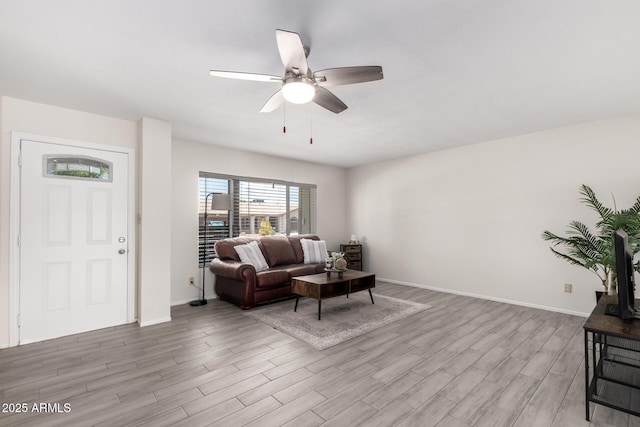 19031 N 13th Dr, Phoenix, AZ 85027 - living area with wood finished floors, a ceiling fan, and baseboards